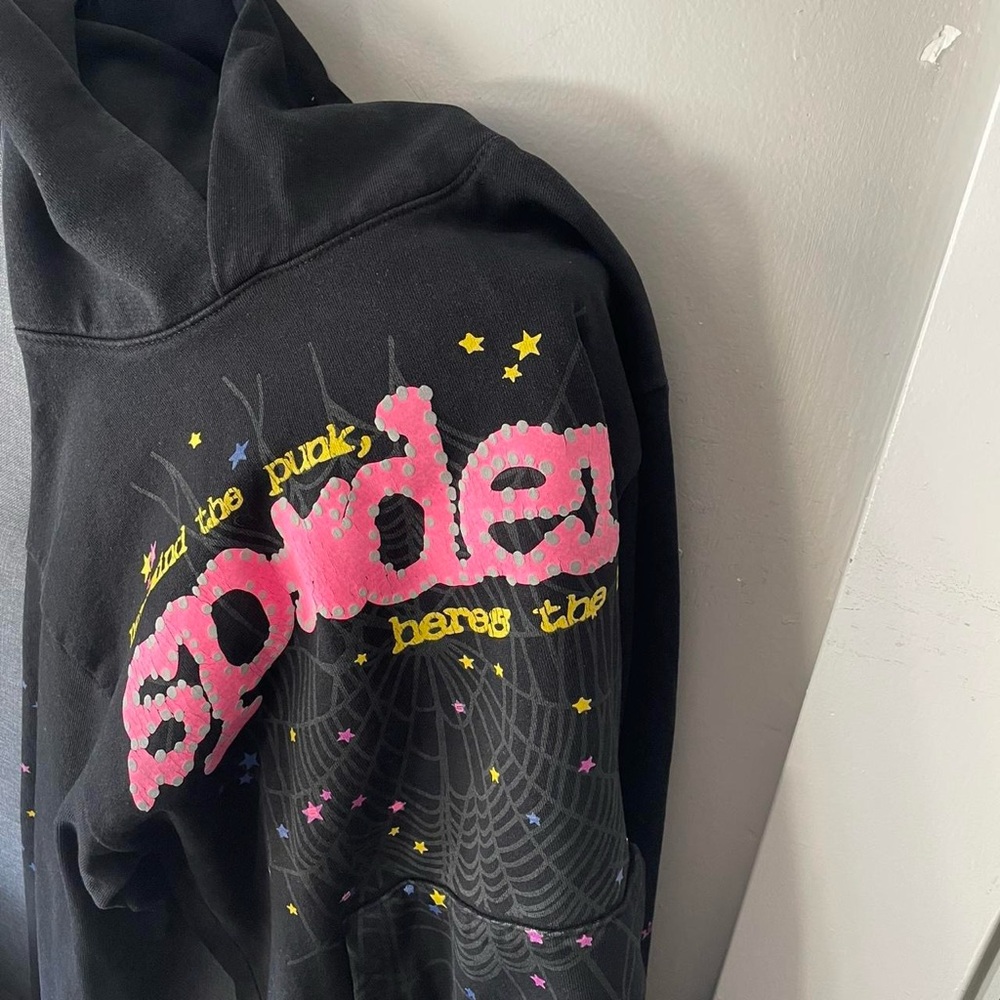 Black and Pink Graphic Sweater with Urban Aesthetic